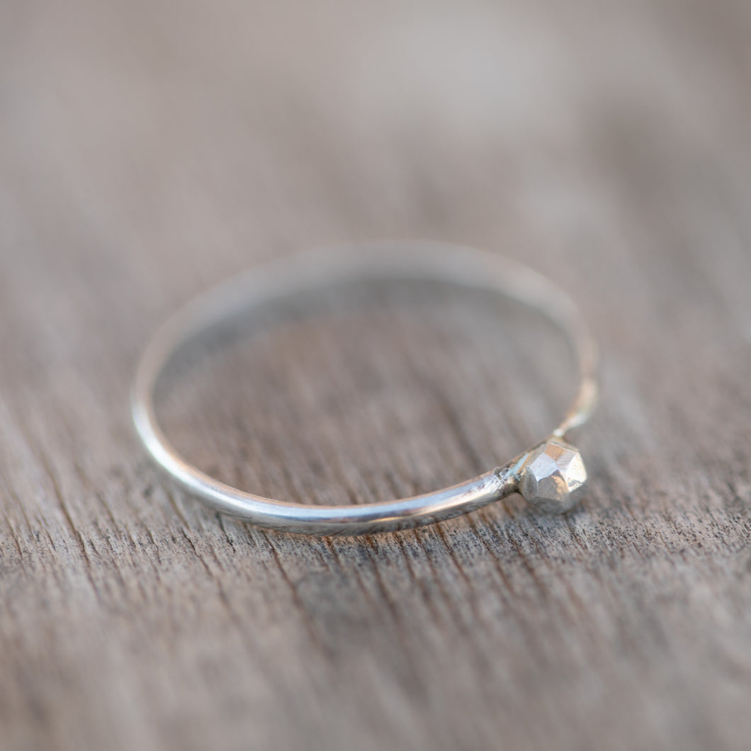 A Silver Proposal Stacker Ring